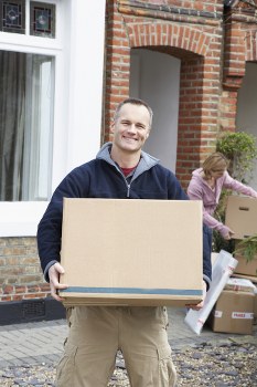 Removal van and moving team in Finsbury Park street