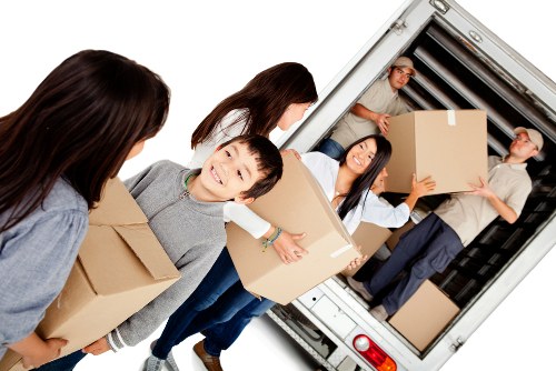 Van moving team preparing items safely for transport