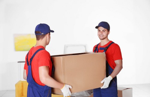 Removal team planning a home move in a Finsbury Park street