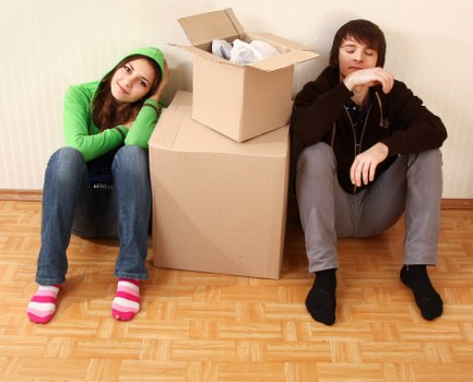 Professional movers loading household items for a North London relocation