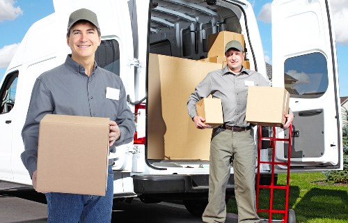 Professional mover carrying household items in Finsbury Park