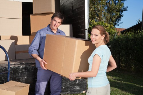 Professional mover assessing safe transport procedures during a relocation
